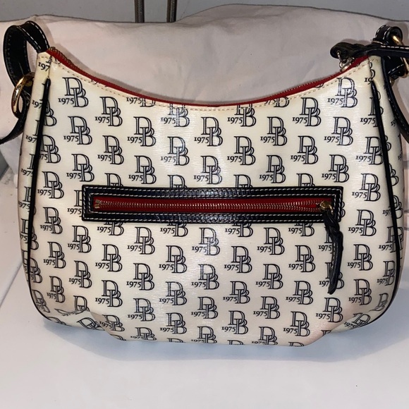 Dooney & Bourke Handbags - Dooney & Bourke Black and Cream Patterned Shoulder Bag